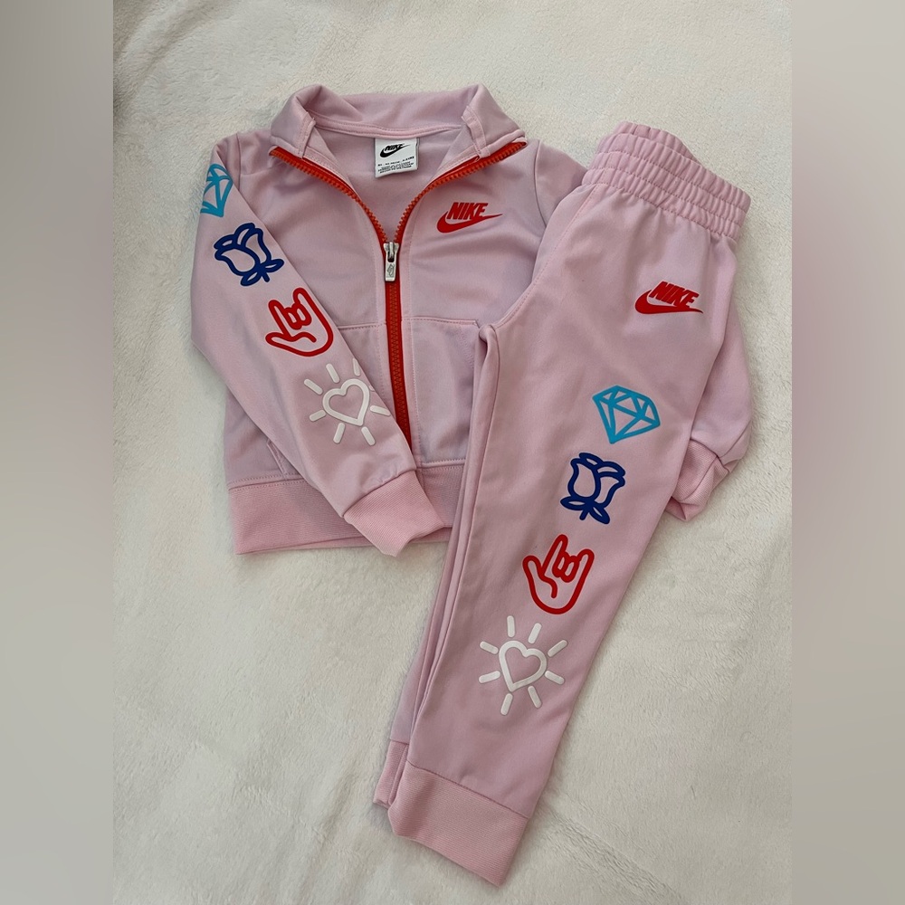 Nike Pink Tracksuit with Red and Blue Accents